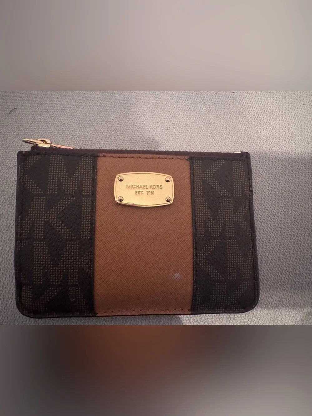 Michael Kors Brown and Black Signature Bi-Fold Wallet with Gold Plaque